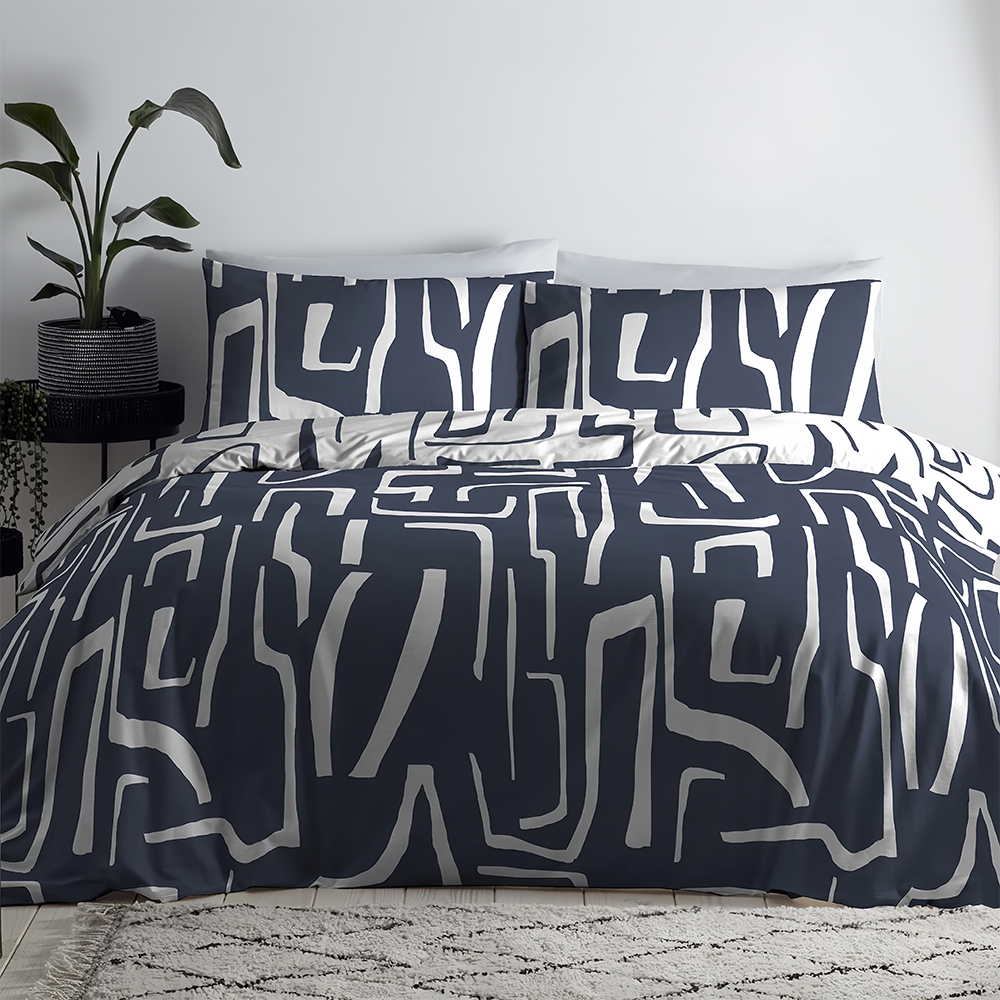 Set cuvertură de pilota cu imprimeu geometric Adria Set de lenjerie de pat